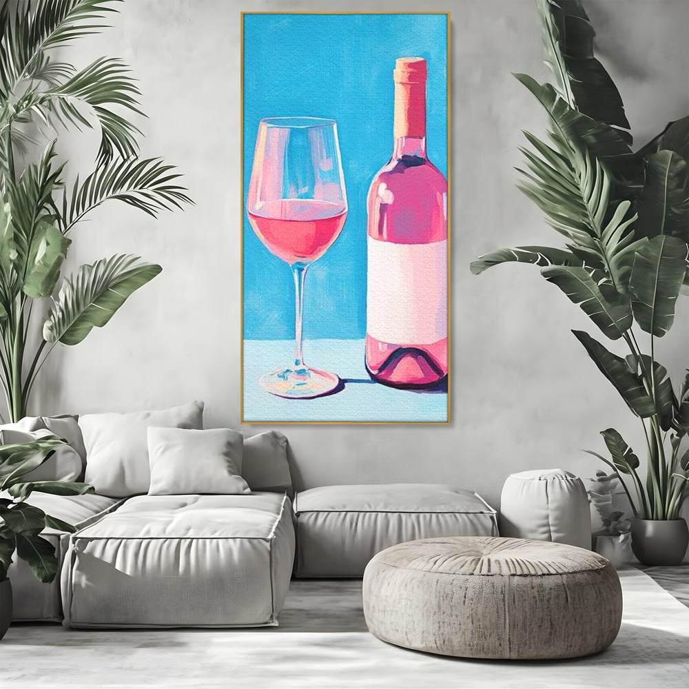 Tablou canvas cu pictura cu sticla de vin rose si pahar, in rama de aluminiu auriu, pe perete intr-un living